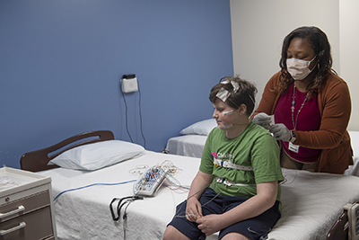 patient undergoing a sleep study 